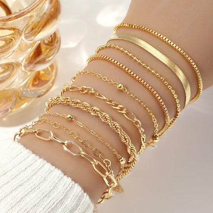 Solara – 10-Piece Layered Gold Bracelet Set